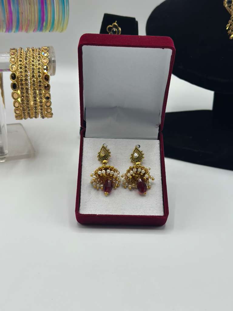 The Crimson Pearl Jhumkas: Antique Gold with Ruby-Glass Drops